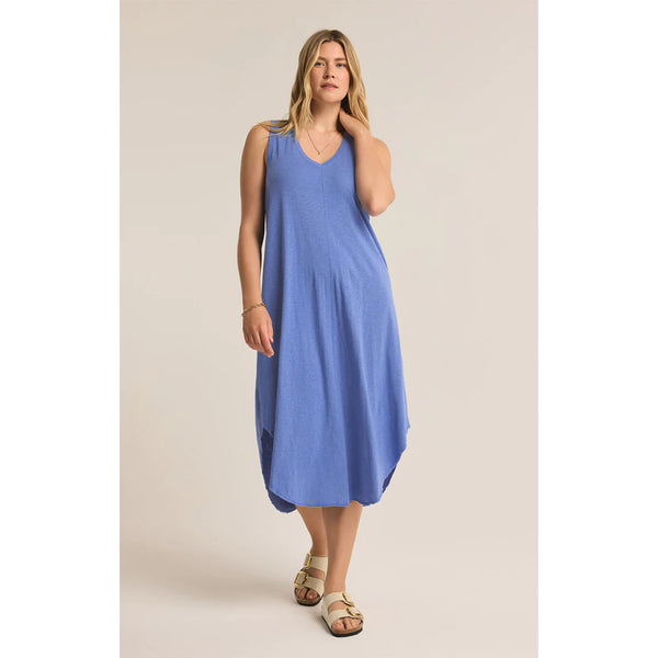Model wearing sandals and Z Supply Reverie Midi Dress in Blue Wave in front of a white backdrop