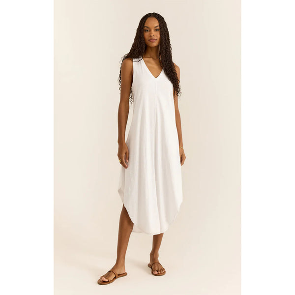 Model wearing Z Supply Reverie Midi Dress in White in front of a white background