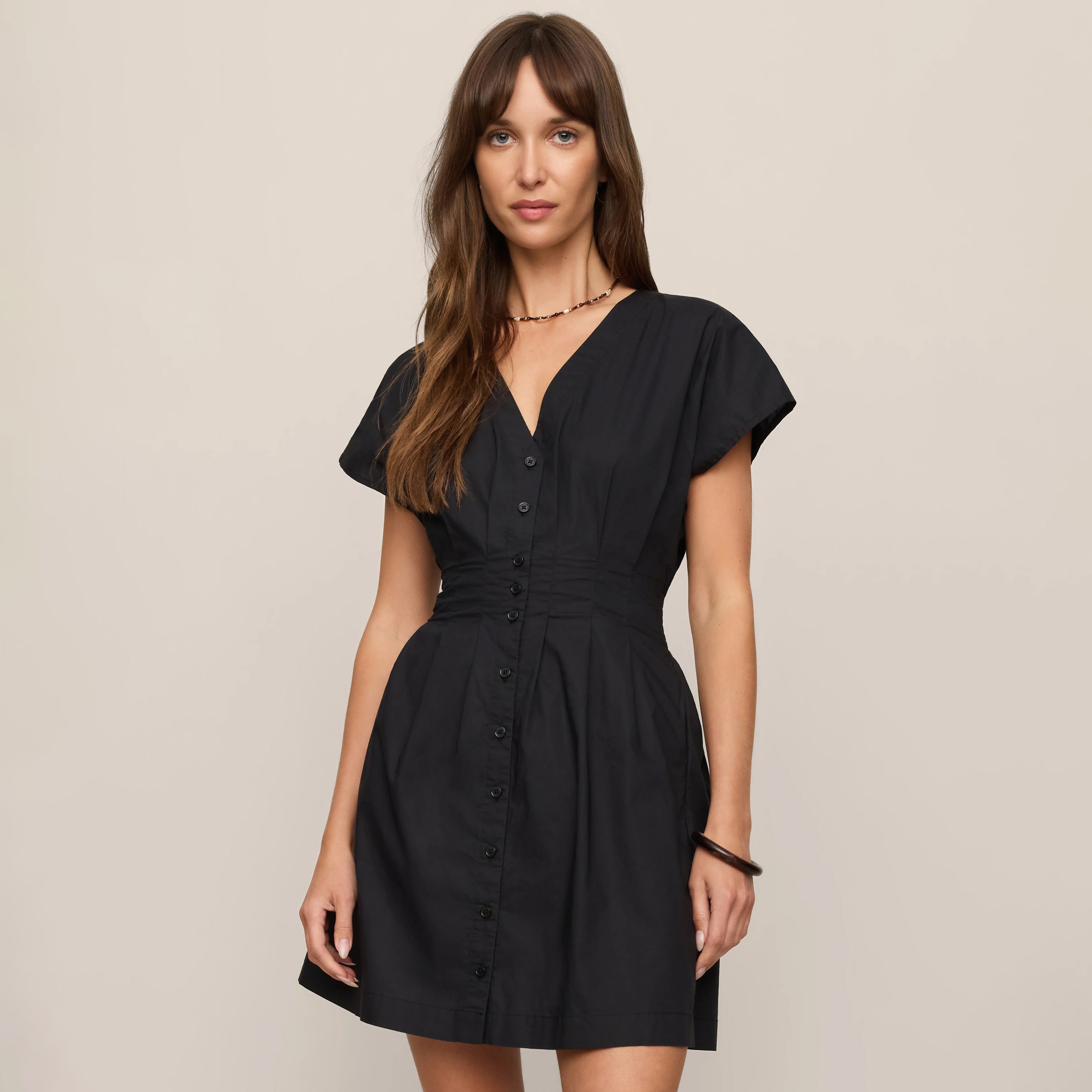 Z Supply Sanna Mini Dress in Black shown on model on plain background.