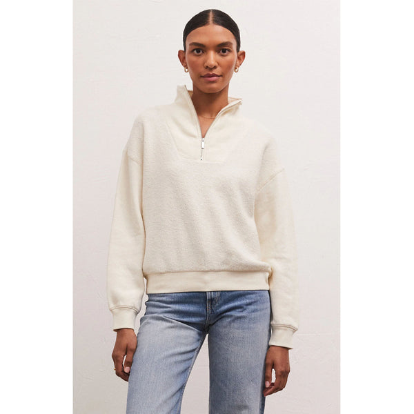 Model wearing jeans and Z Supply Sequoia Fleece Sweatshirt in Sandstone in front of a white background