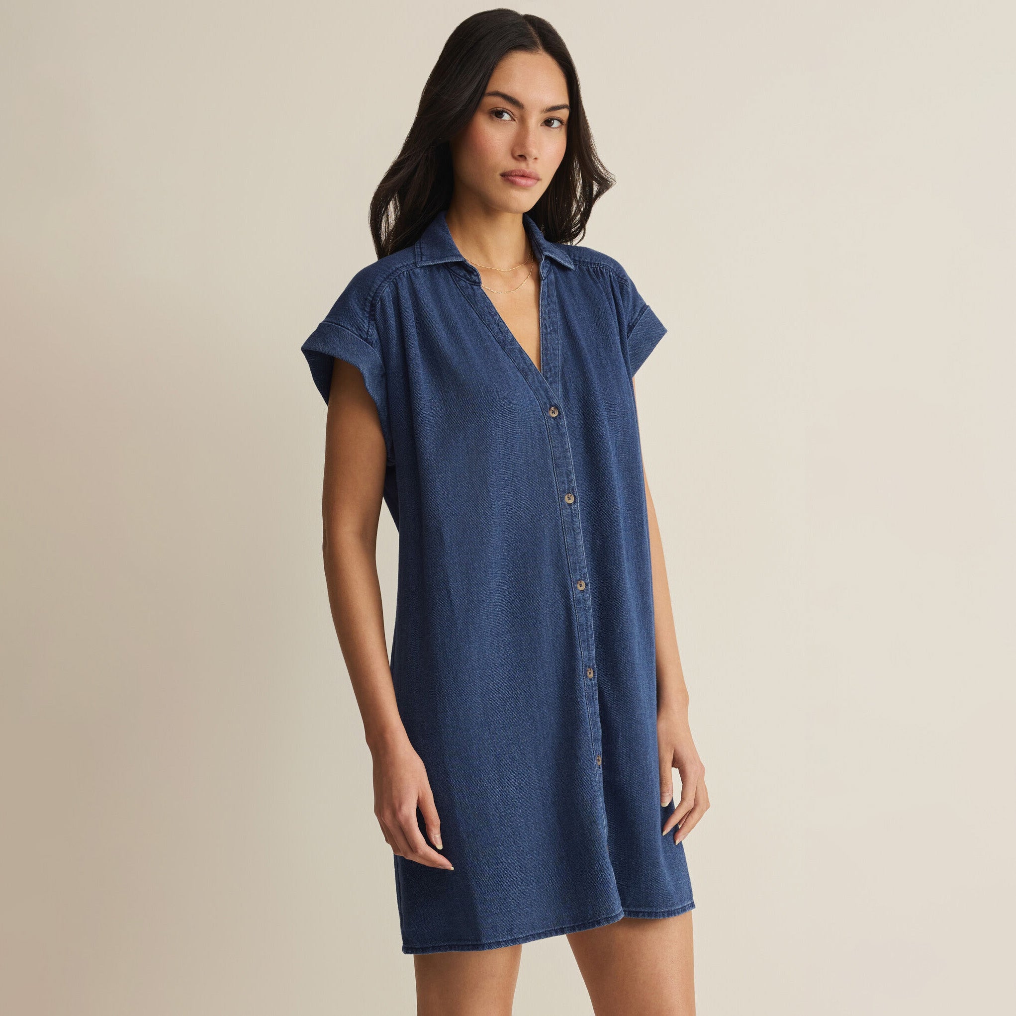 Woman wearing Z Supply Shellbound Twill Dress in Twilight Blue on plain background at Addison West.