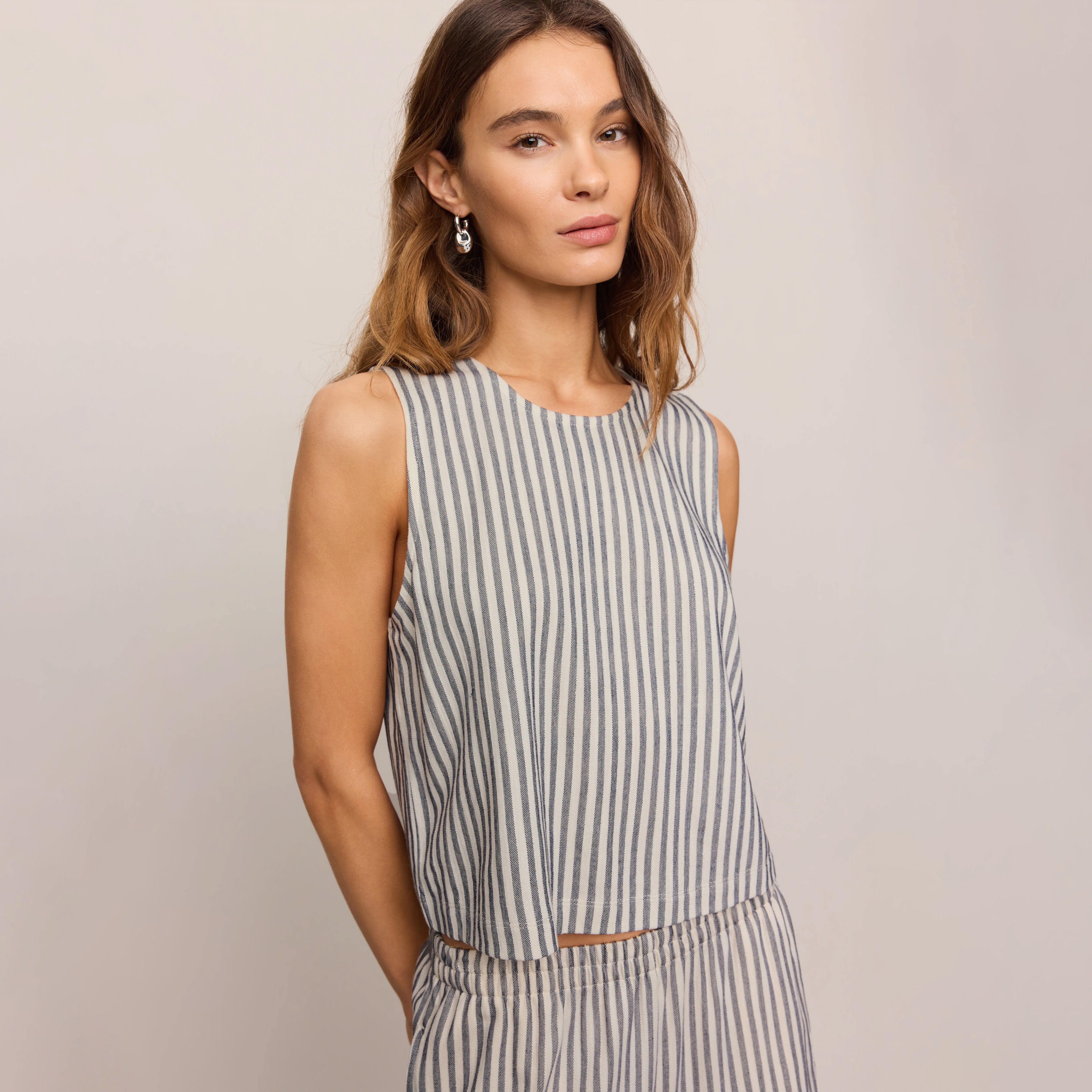 Z Supply Sloane Knit Striped Top in Eclipse shown on model on plain background.