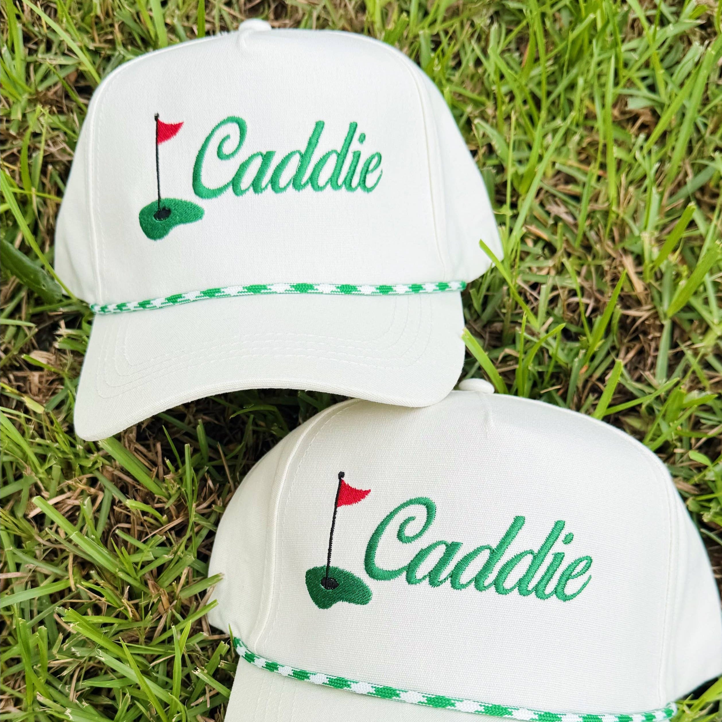 Caddie Baseball Hat on the grass at Addison West