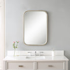 Marwell Vanity Accent Mirror on a white wall in a bathroom at Addison West