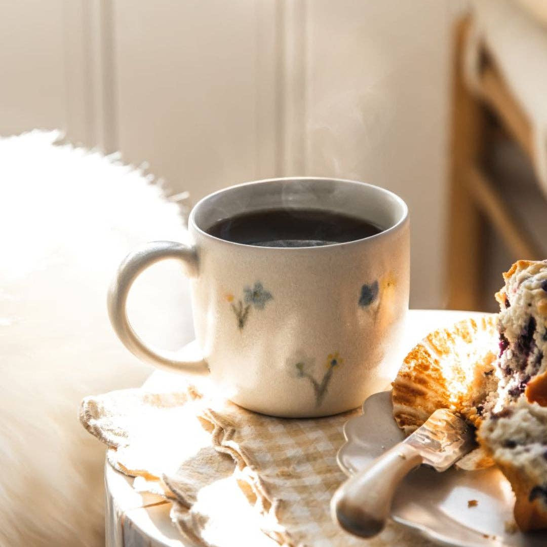 Farmhouse Pottery Floral Meadow Mug on a table at Addison West