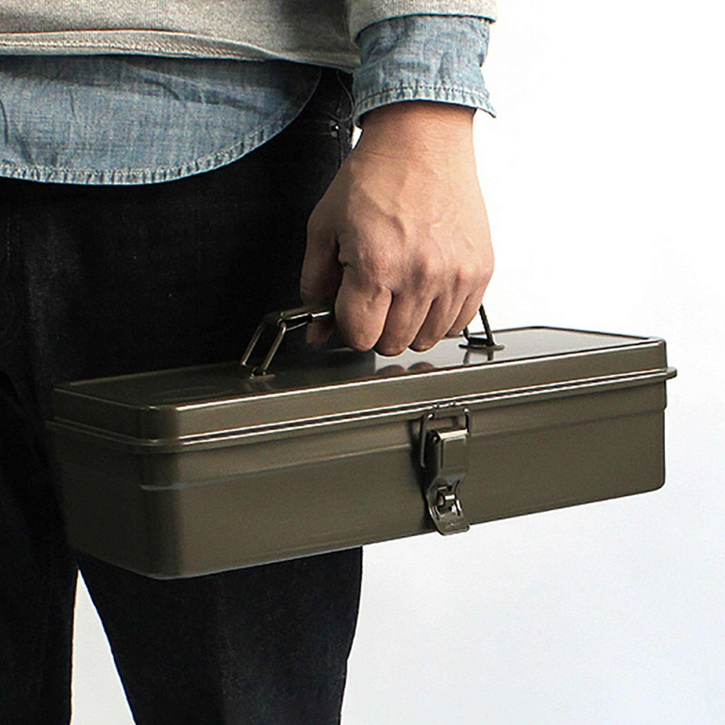 Toyo Steel Toolbox T-320 in Military Green on a white background held by a model at Addison West