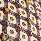 Close up of French Knot Tassels Petite Lumbar Pillow at Addison West