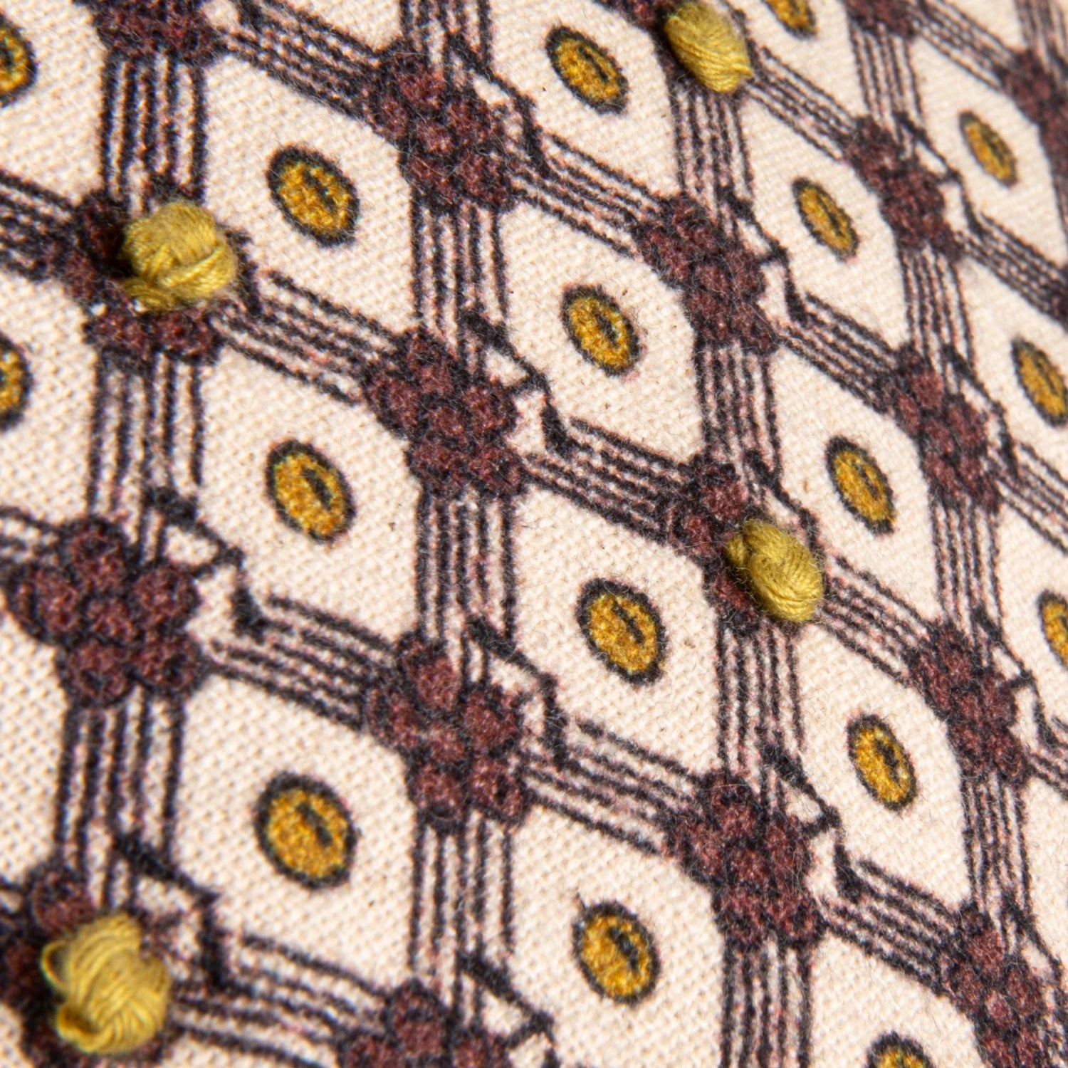 Close up of French Knot Tassels Petite Lumbar Pillow at Addison West