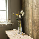 Simon Pearce  Echo Lake Gather Vase on a wood background at Addison West