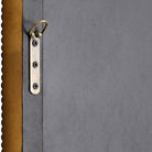 Close up of back of Nalanda Mantel Mirror in Antiqued Gold on a white background at Addison West