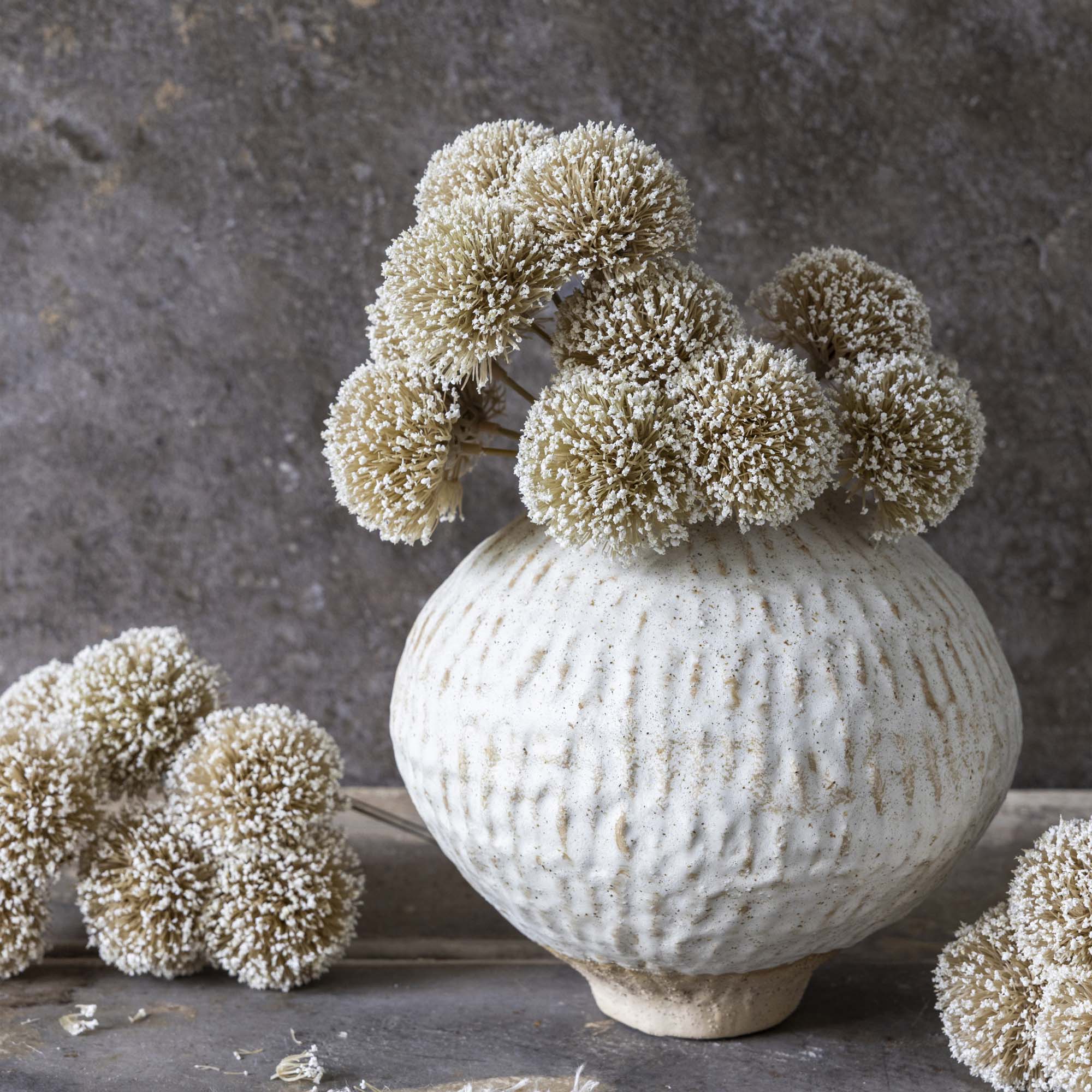 Abigail Ahern Faux Allium Bunch in White in a vase on a grey background at Addison West