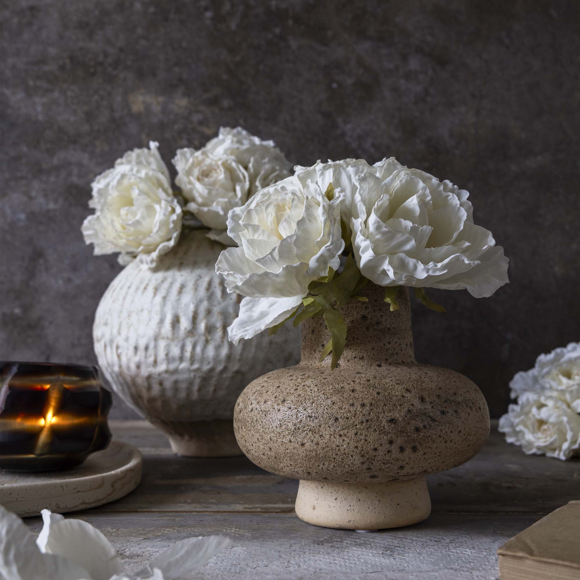 Abigail Ahern Faux Rose Bunch in White in a vase on a grey background at Addison West