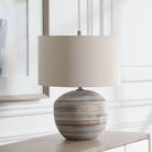 Prowell Table Lamp on a table at Addison West