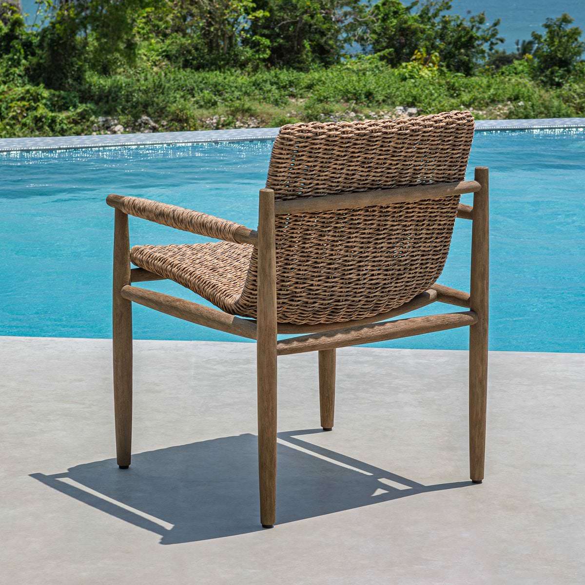 Sutter Outdoor Dining Chair on a patio at Addison West