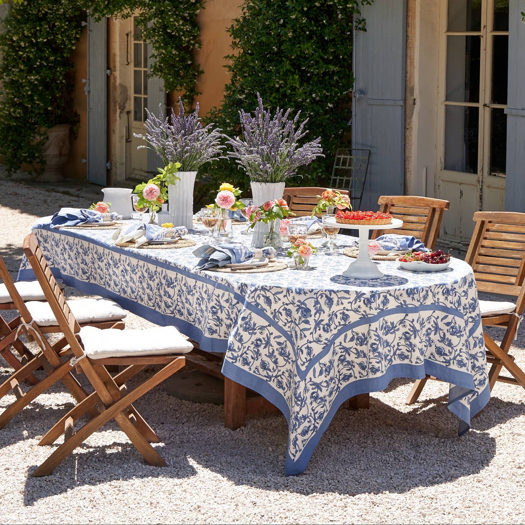 Granada Cornflower Tablecloth 71" x 106" on a table at Addison West