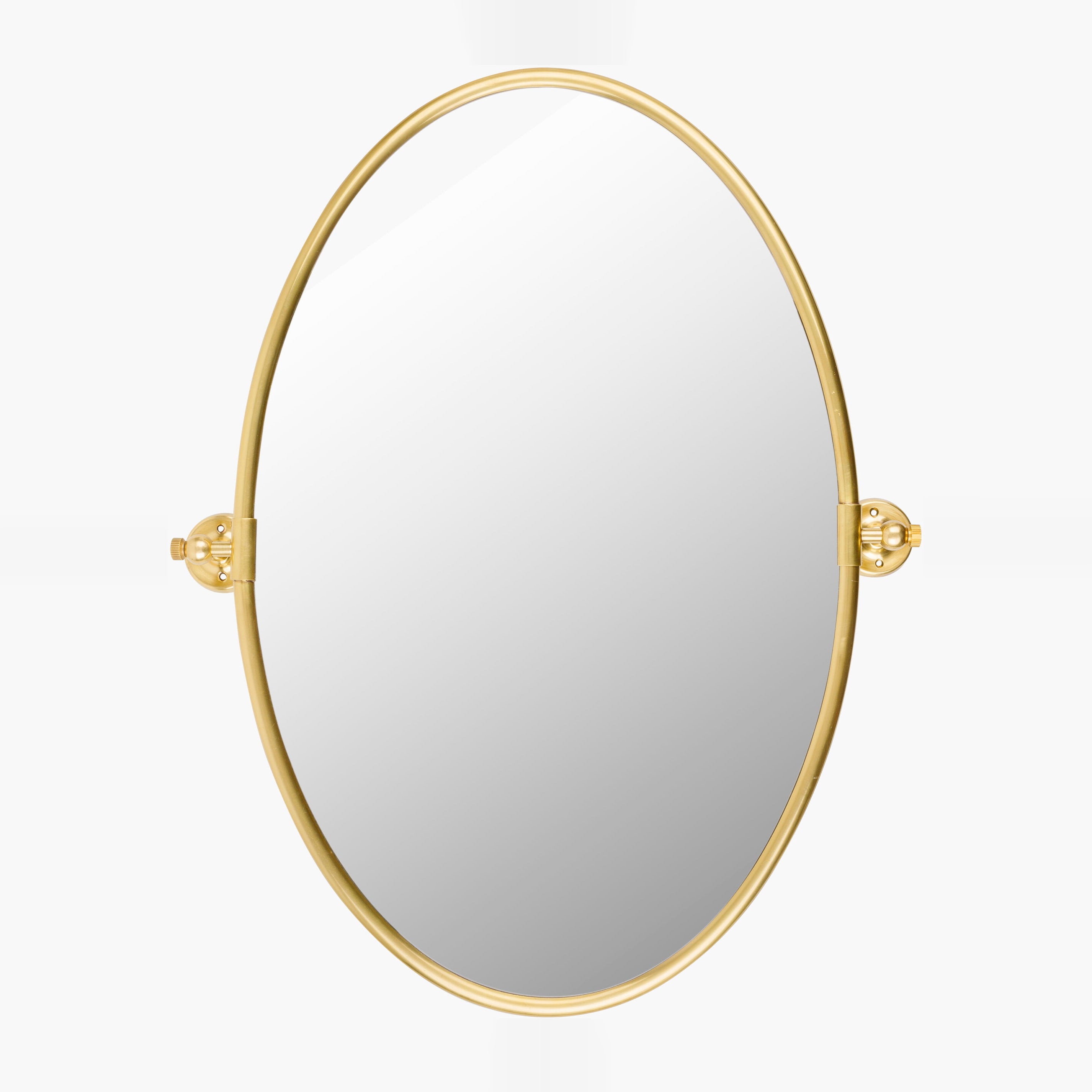 Oval Burnish Accent Mirror in Antiqued Gold on a white background at Addison West