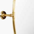 Close up of Oval Burnish Accent Mirror in Antiqued Gold on a white background at Addison West