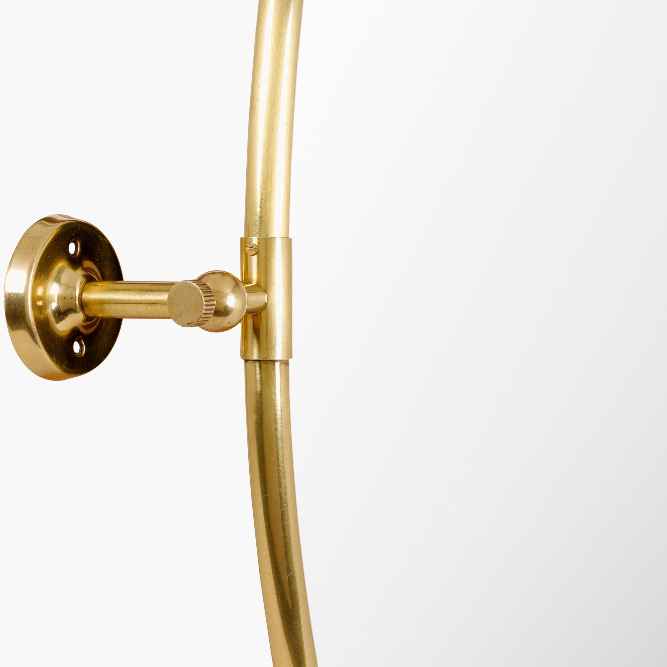 Close up of Oval Burnish Accent Mirror in Antiqued Gold on a white background at Addison West