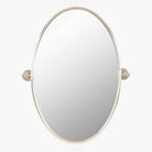 Oval Burnish Accent Mirror in Antiqued Silver on a white background at Addison West