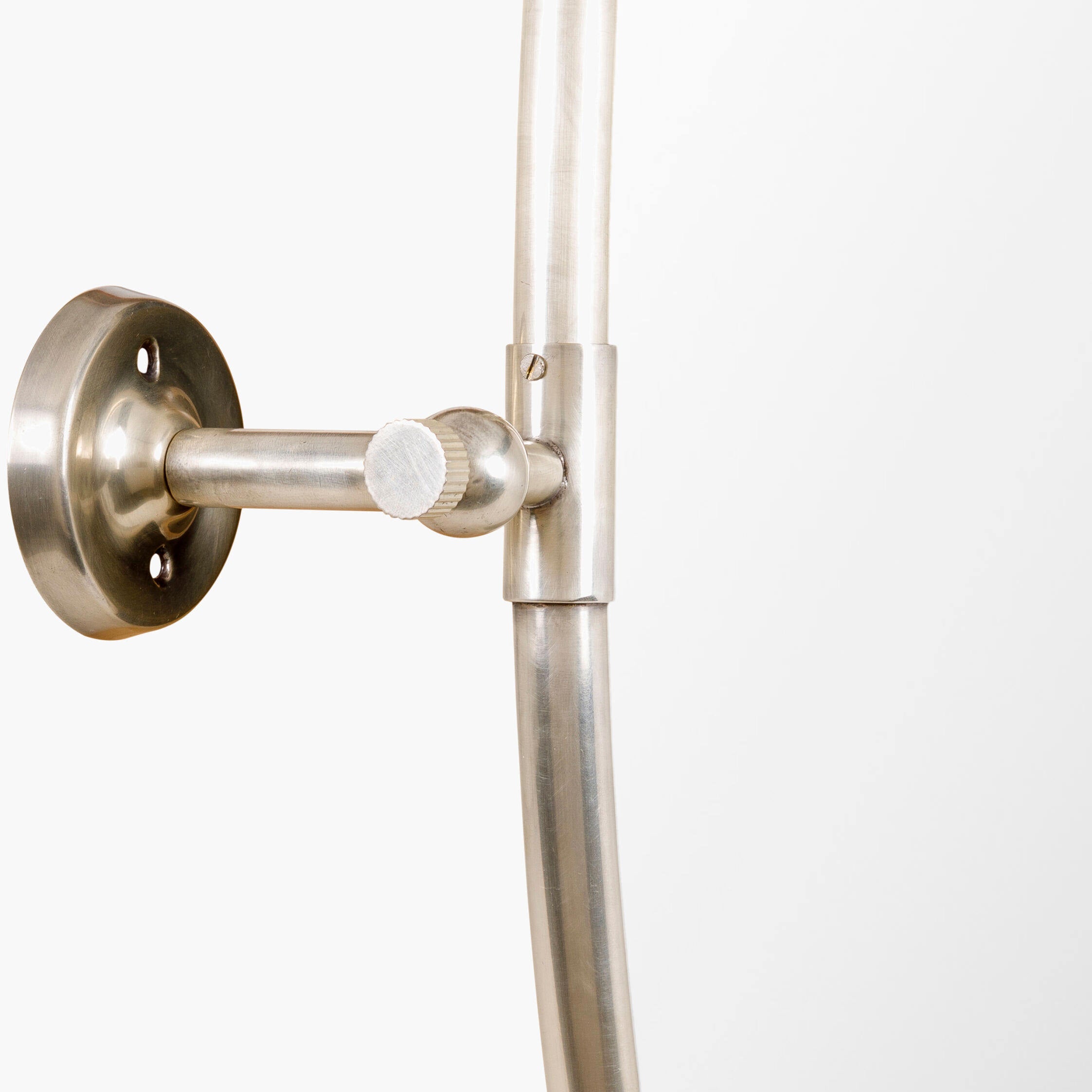 Close up of Oval Burnish Accent Mirror in Antiqued Silver on a white background at Addison West