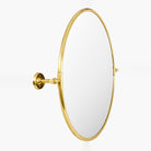 Burnish Round Accent Mirror in Antiqued Gold on a white background at Addison West