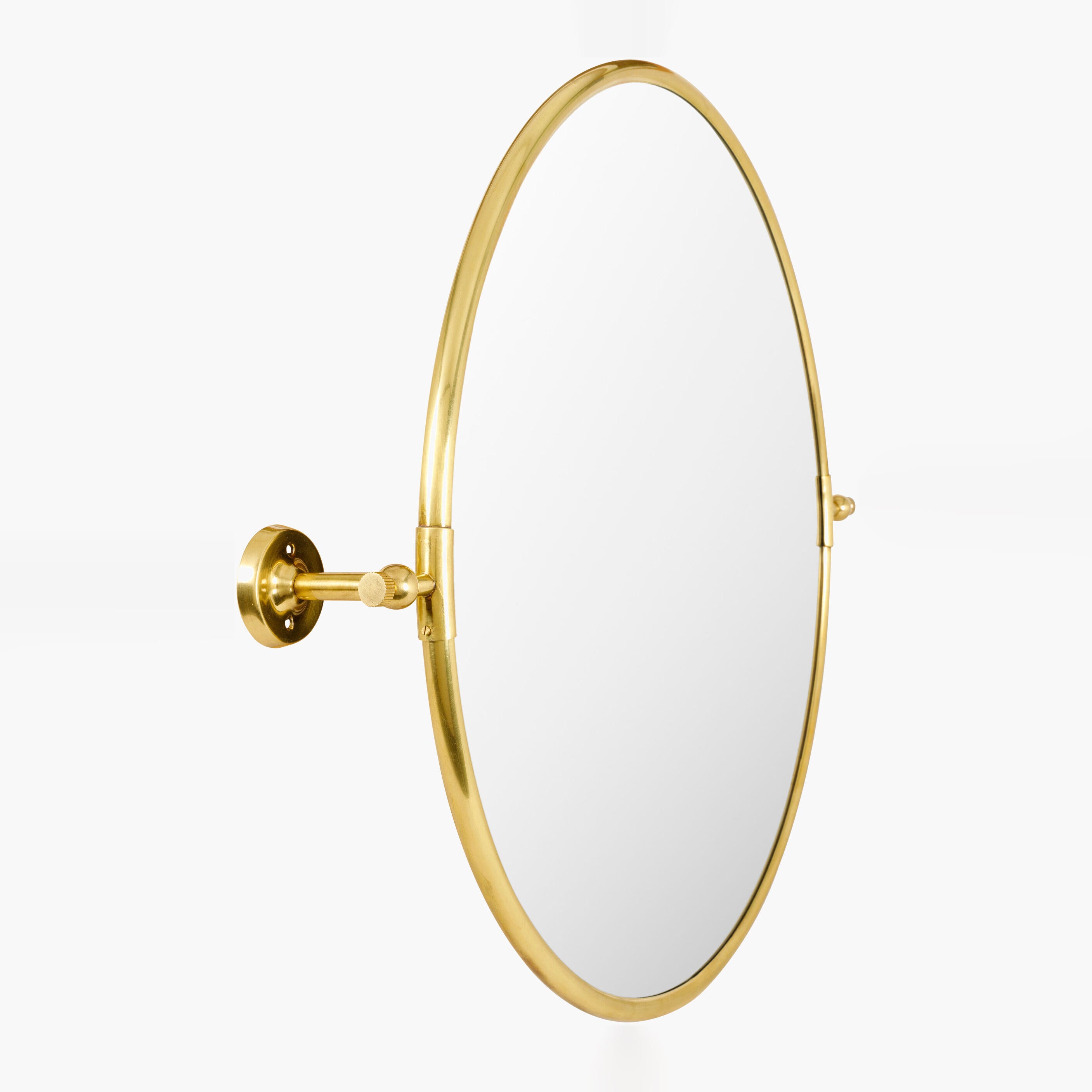Burnish Round Accent Mirror in Antiqued Gold on a white background at Addison West