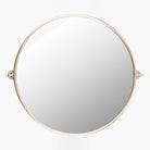 Burnish Round Accent Mirror in Antiqued Silver on a white background at Addison West