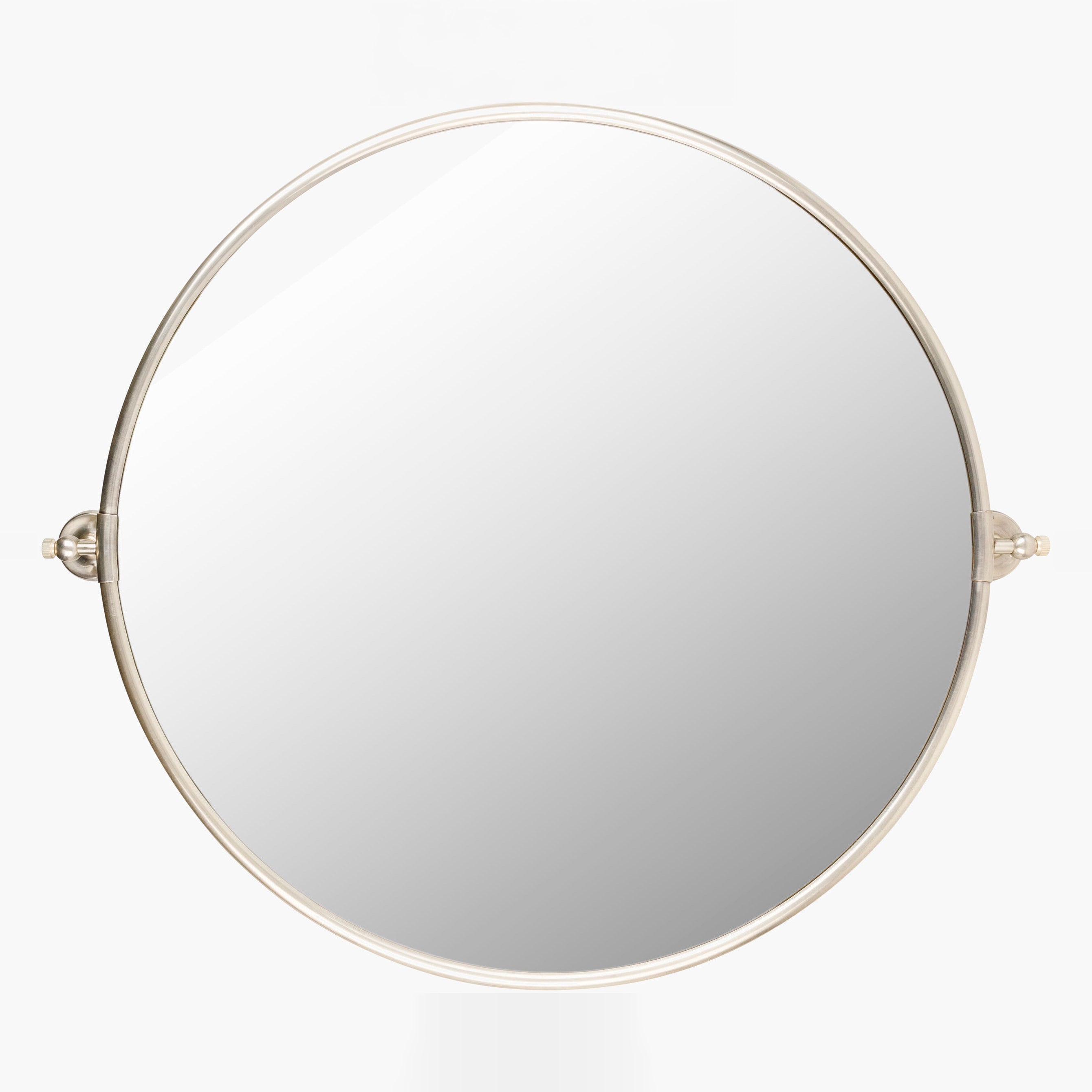 Burnish Round Accent Mirror in Antiqued Silver on a white background at Addison West