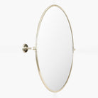 Burnish Round Accent Mirror in Antiqued Silver on a white background at Addison West
