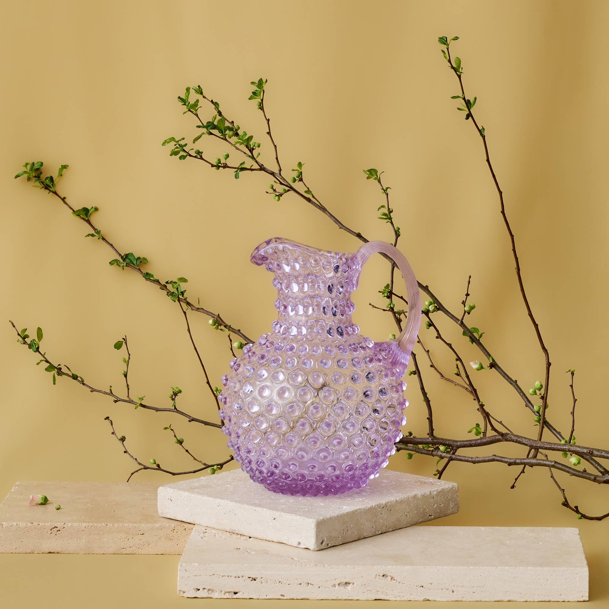 Hobnail Glass Pitcher in Lilac Bloom on a table at Addison West