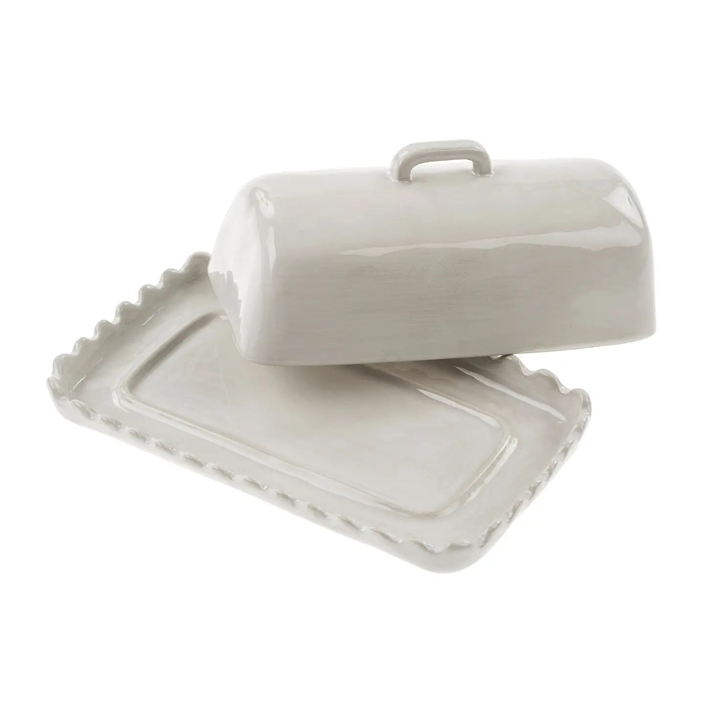 White ceramic butter dish with lid on a white background