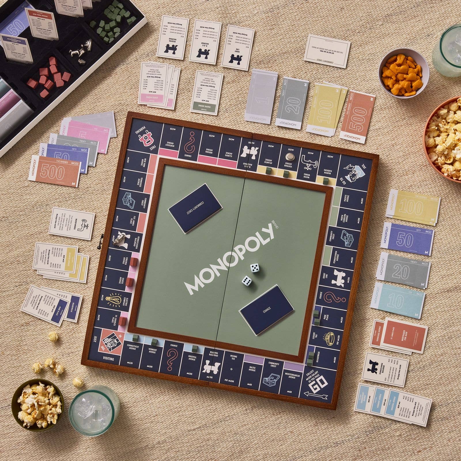 Monopoly Grand Folding Edition on a table at Addison West