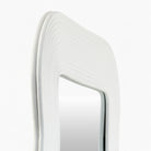 Close up of Dance Accent Mirror in White on a white background at Addison West