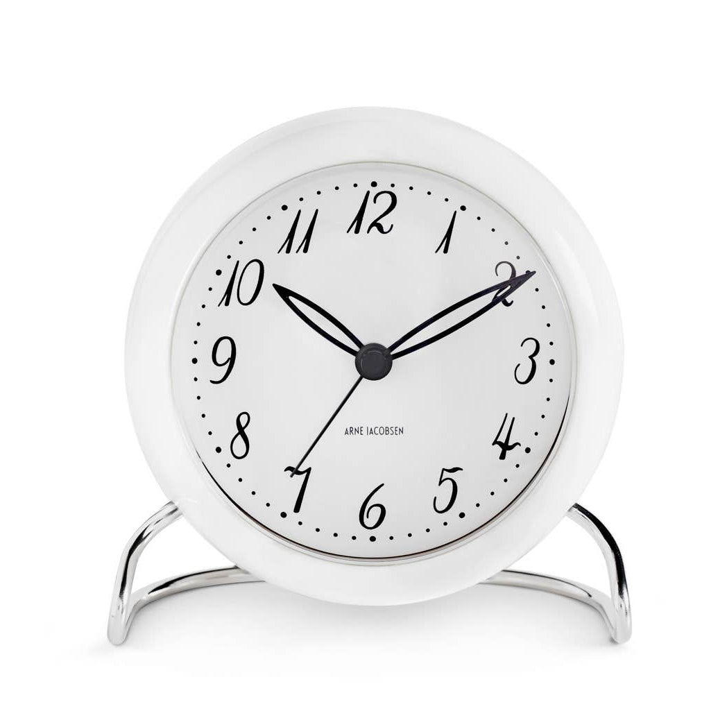 Arne Jacobsen LK Table Clock in White on a white background at Addison West
