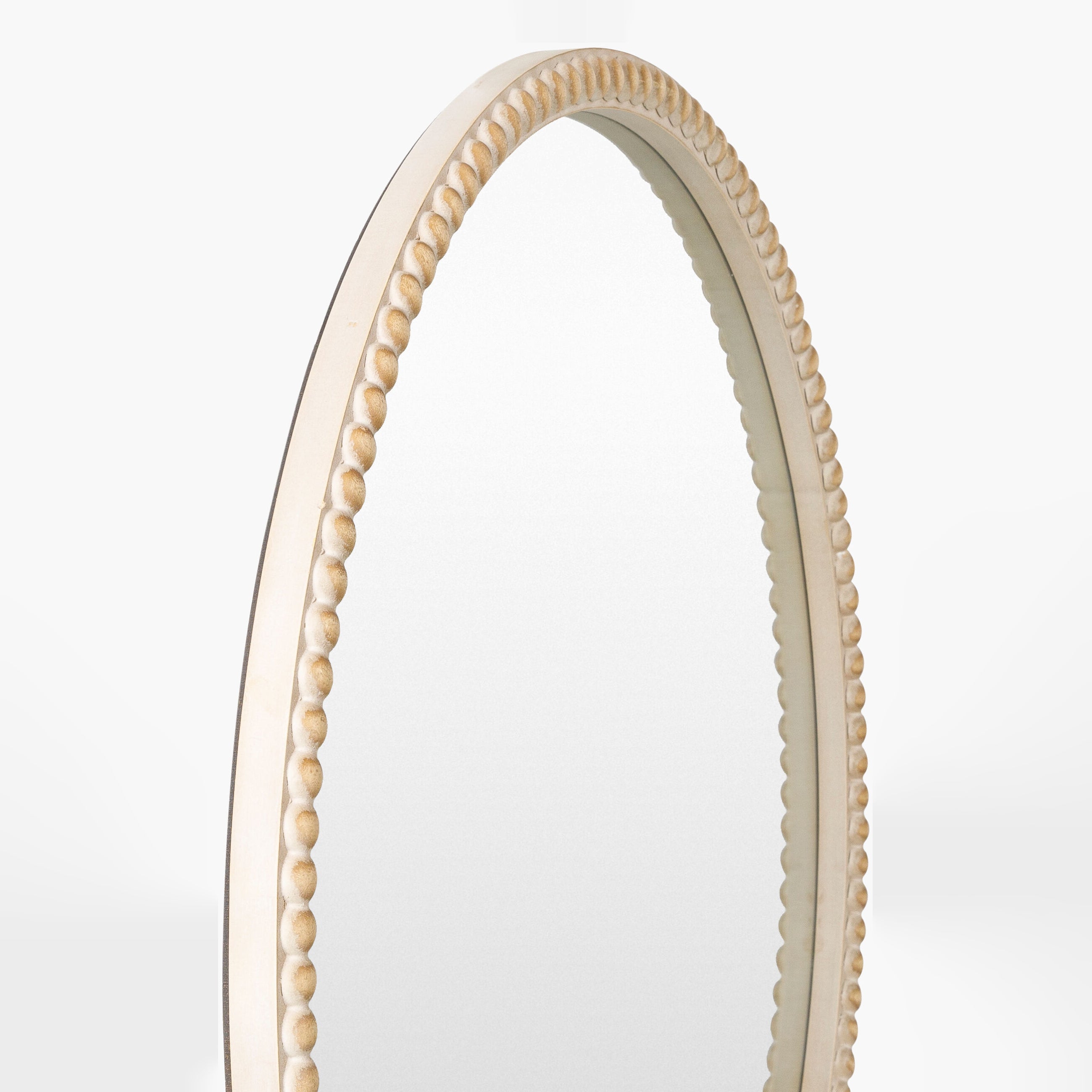 Close up of Dwarka Accent Mirror on a white background at Addison West