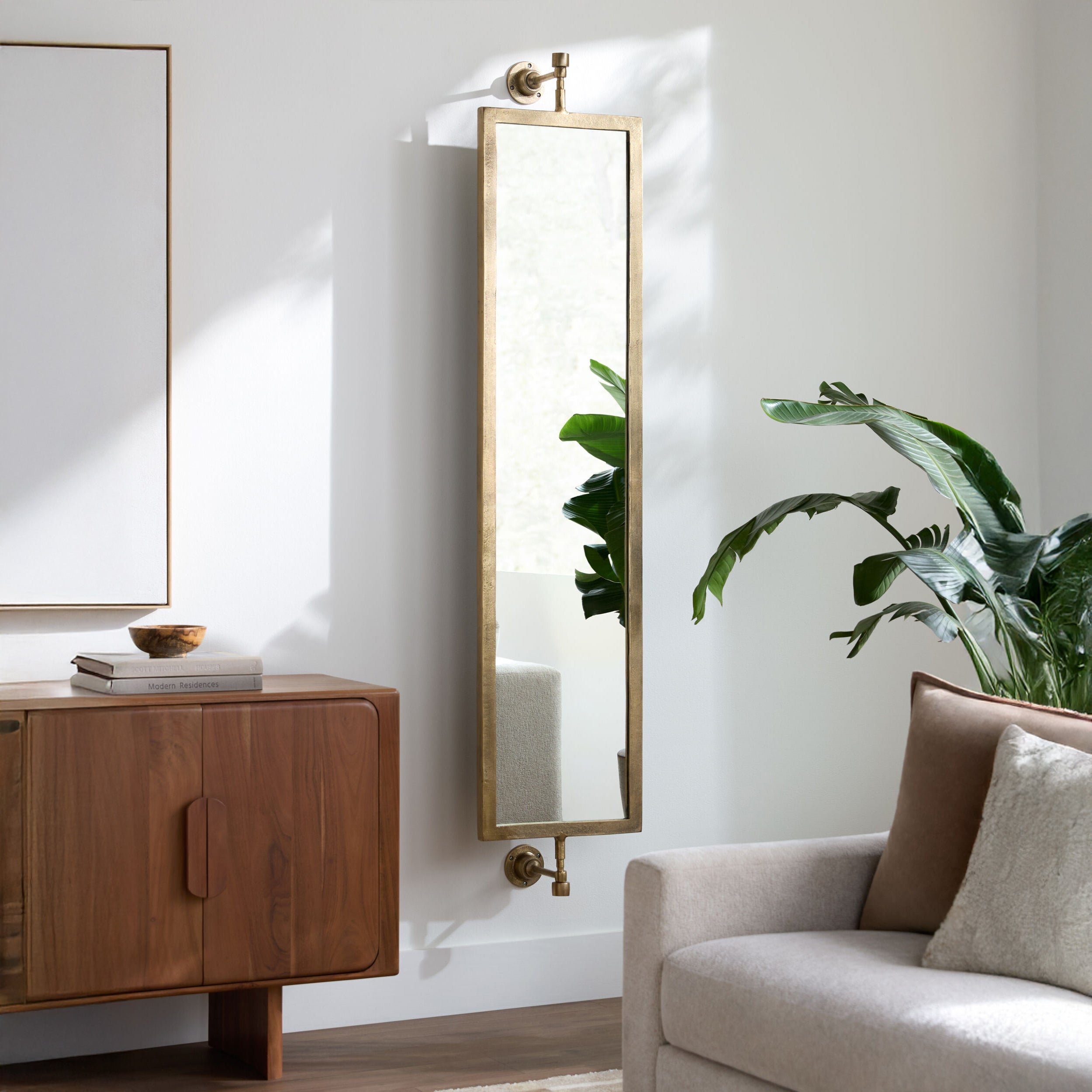 Emmeline Full Length Mirror on a white wall in a room at Addison West