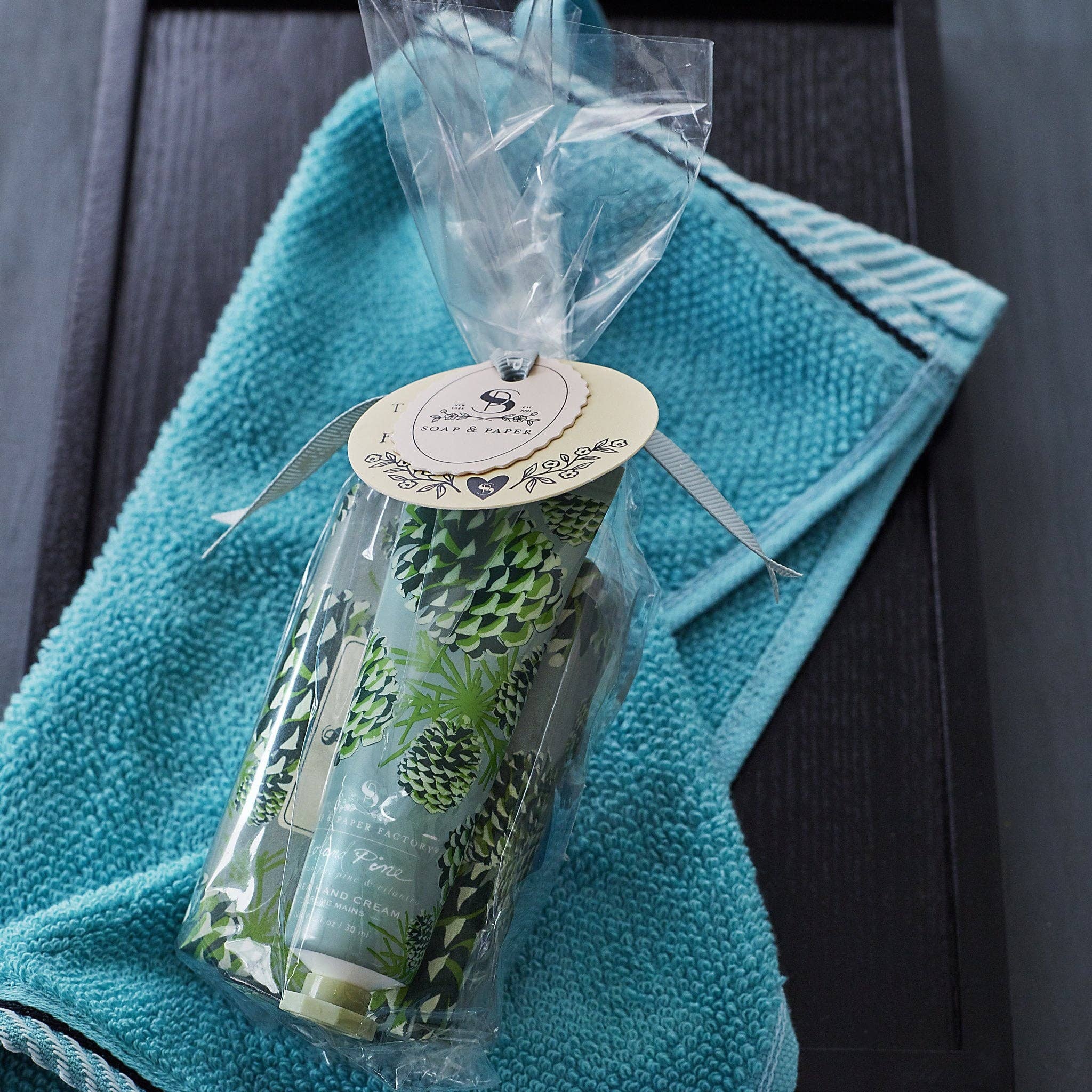 Roland Pine Hand Cream & Soap Gift Set on a black background at Addison West