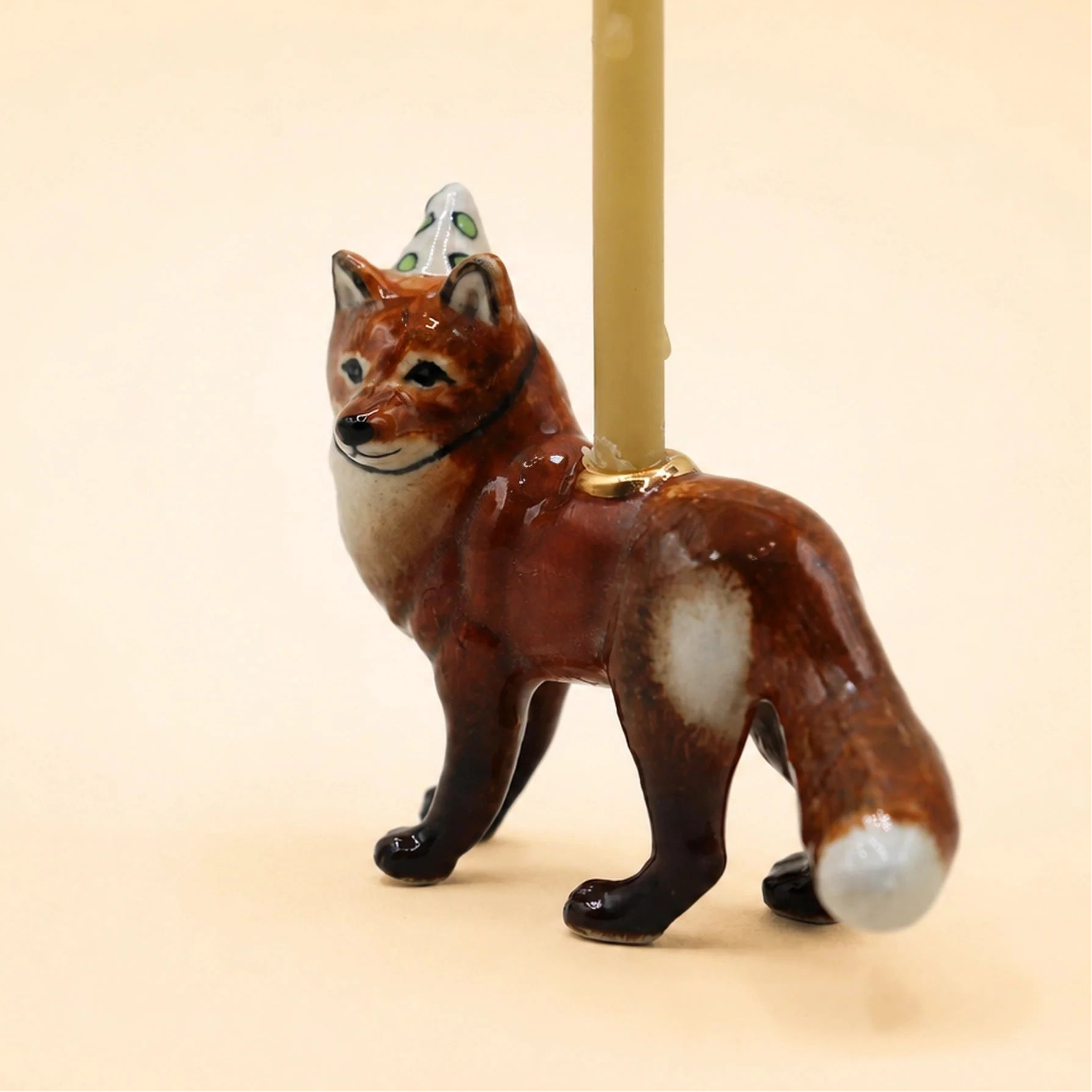 Camp Hollow Red Fox Cake Topperon a beige background at Addison West