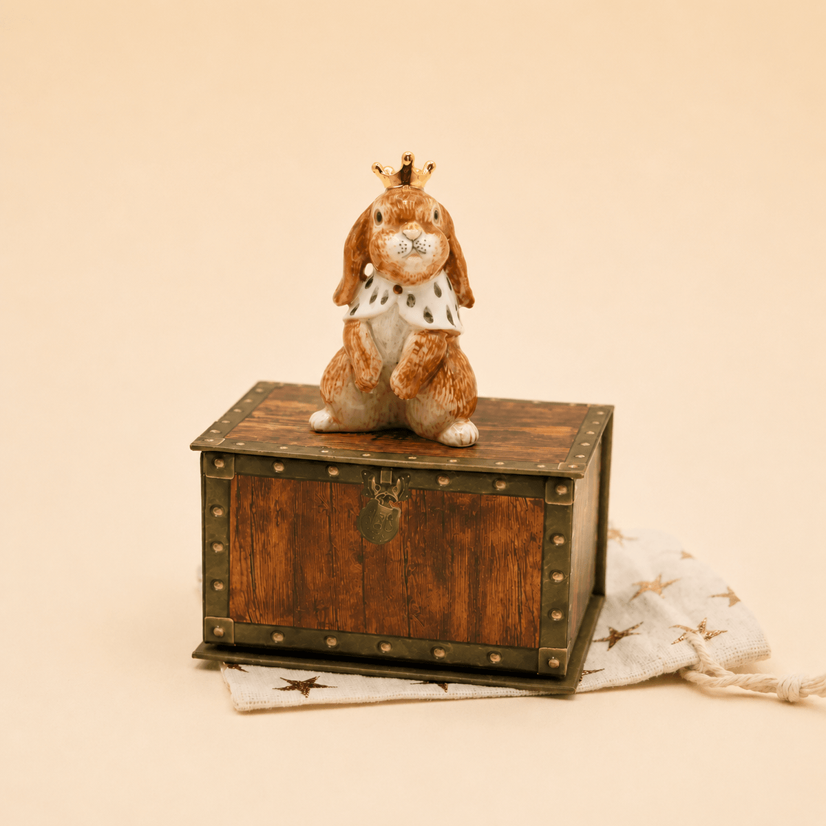 Camp Hollow Highness Hare Cake Topper on a beige background at Addison West