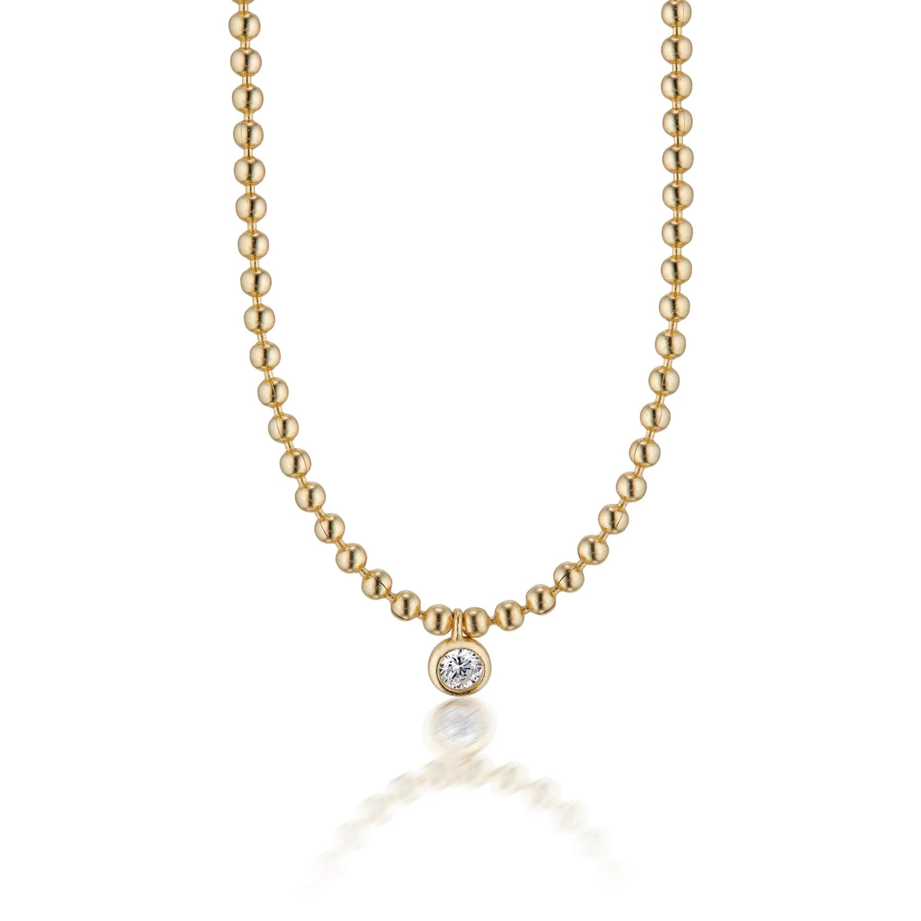 Juliette Gold Ball Necklace on a white background at Addison West