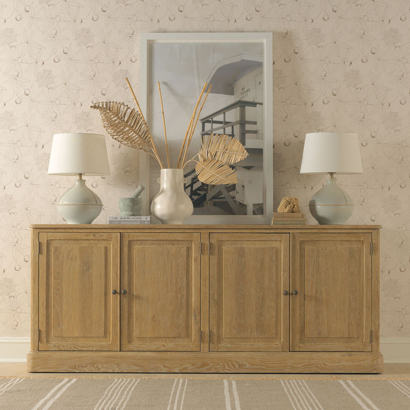 Woodbridge Furniture Baker's Sideboard in Limewash Finish in a dining room at Addison West
