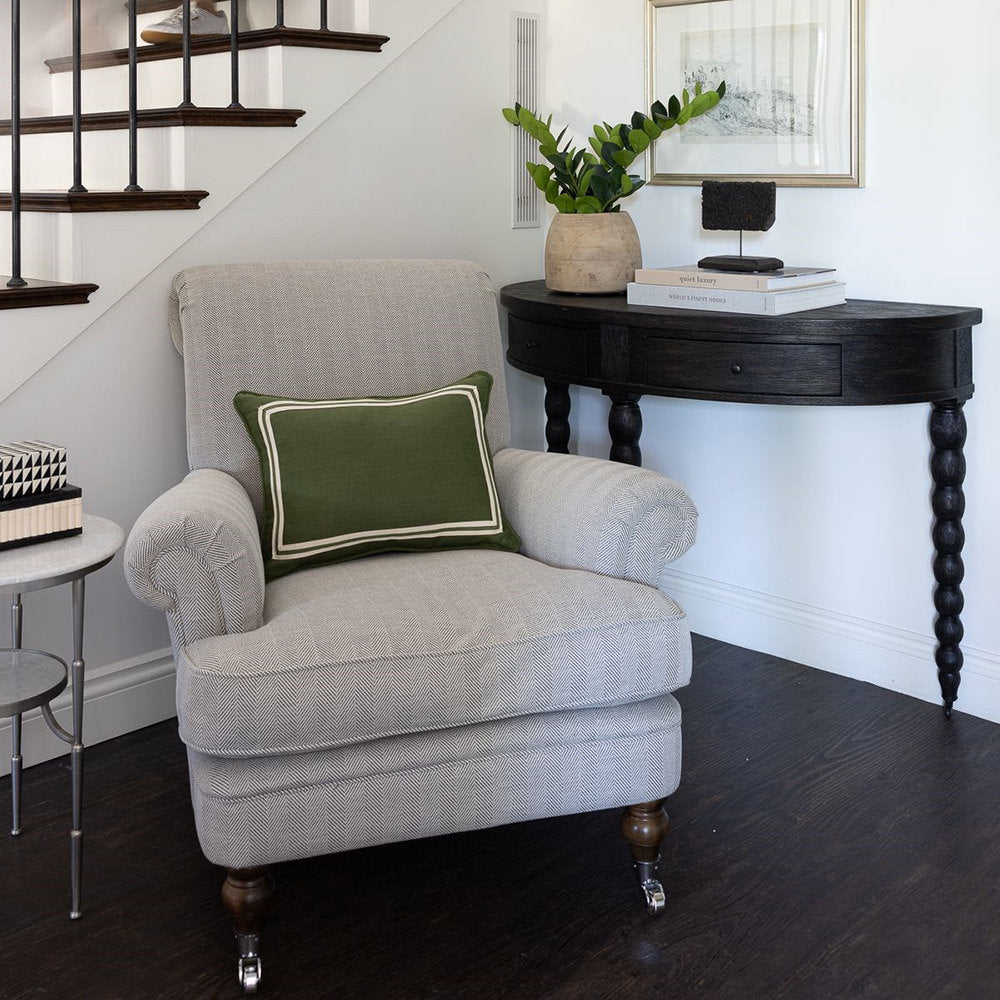 Woodbridge Furniture Salutation Demilune Table in Worn Black Finish on a white wall at Addison West