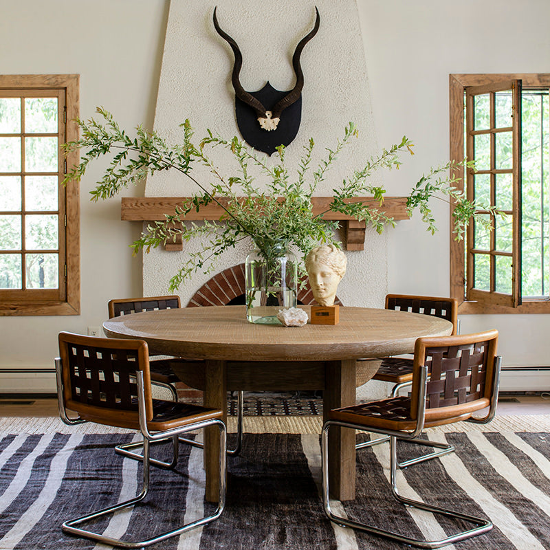 Revival Chair at a dining table at Addison West