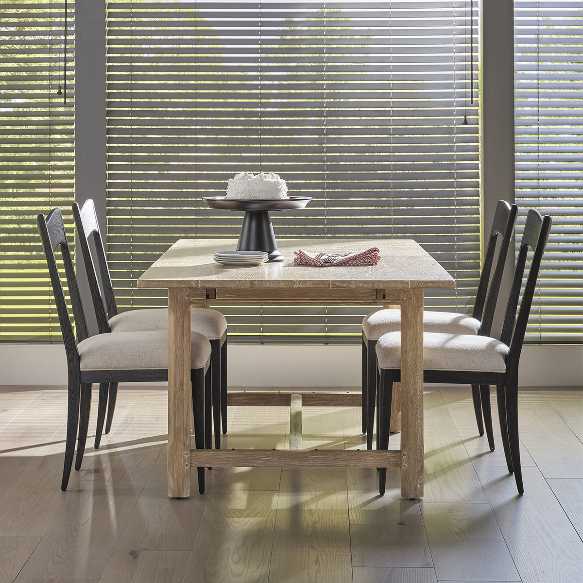 Woodbridge Furniture Forever Table in a dining room at Addison West