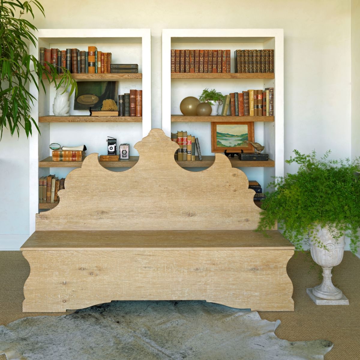 Folk Storage Bench in front of built in bookshelves at Addison West