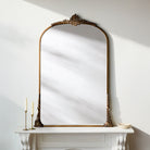 Nightingale Accent Mirror on a white mantle at Addison West