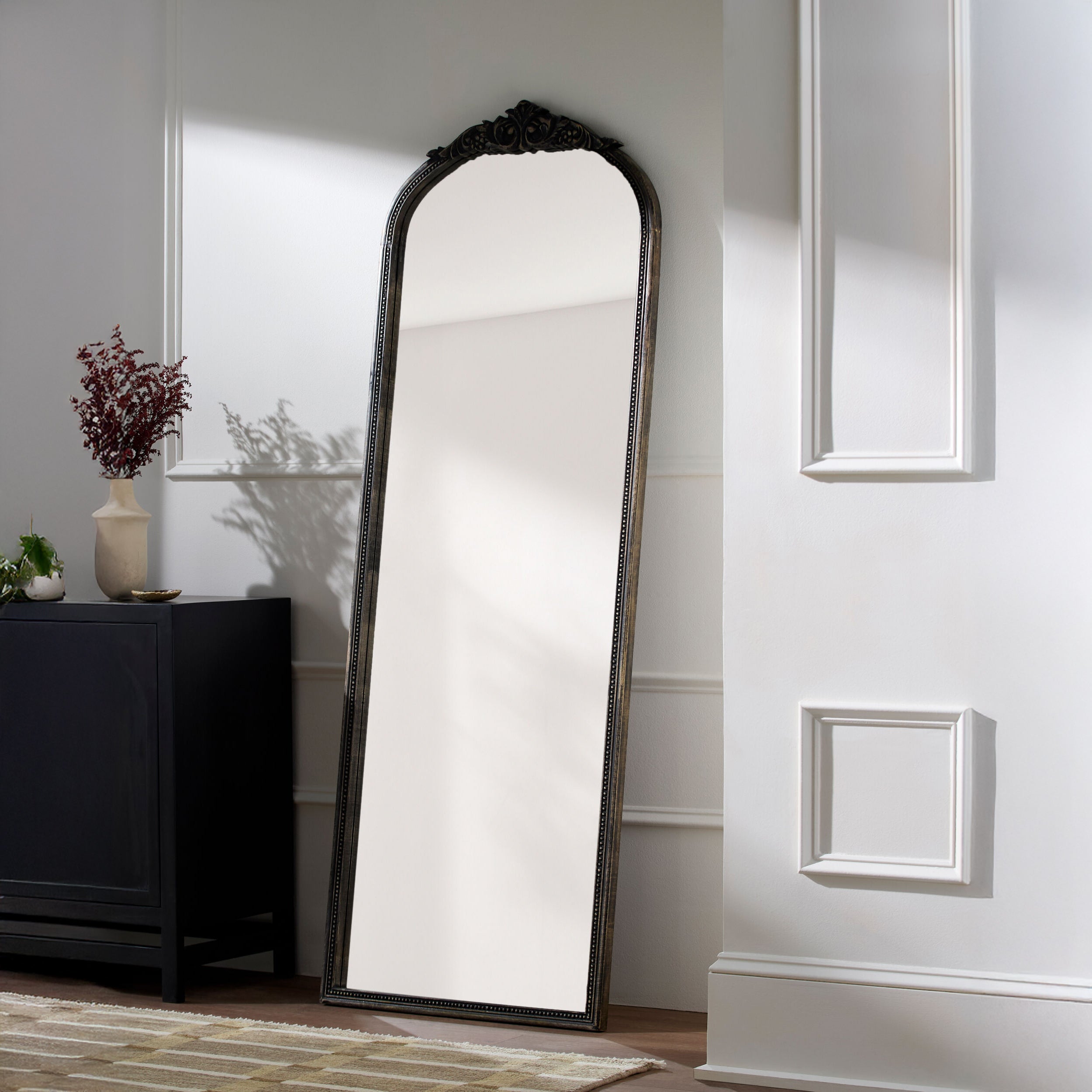 Noya Full Length Mirror on a white wall at Addison West