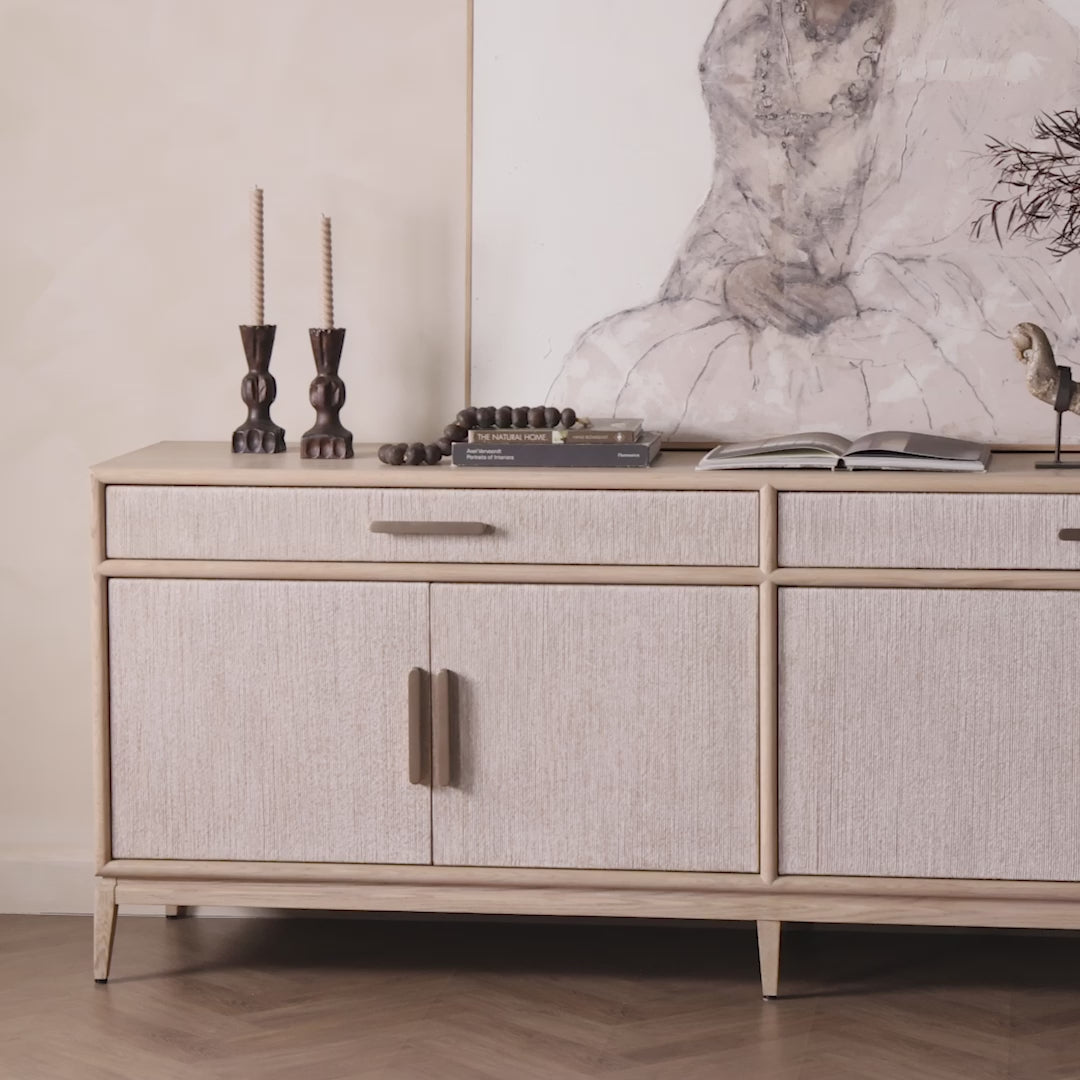 Four Hands Rosenell Sideboard in Natural Paper Cord against a white wall at Addison West