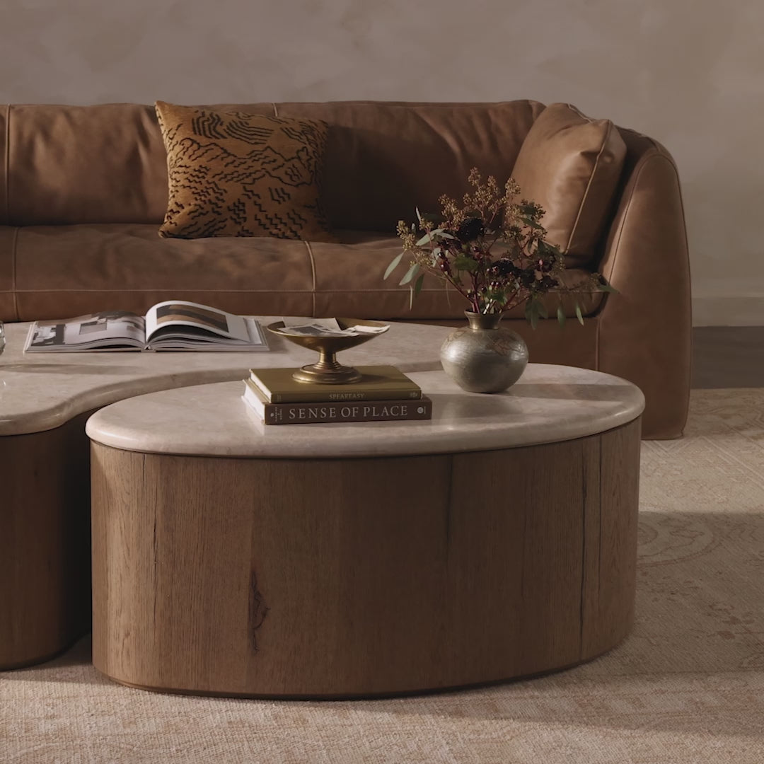 Video of Four Hands Ingrid Coffee Table in Cappuccino Marble in a beige living room at Addison West