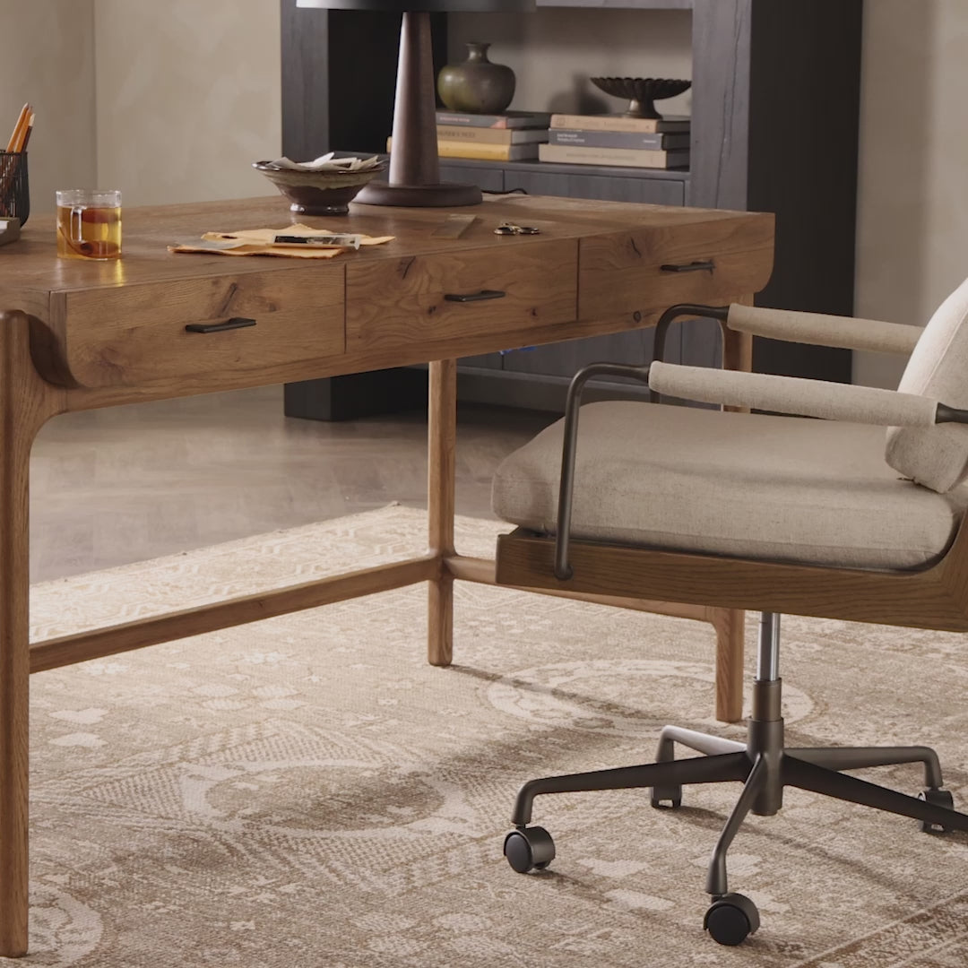 Four Hands Bloomfield Desk in Resawn Worn Oak in an office at Addison West